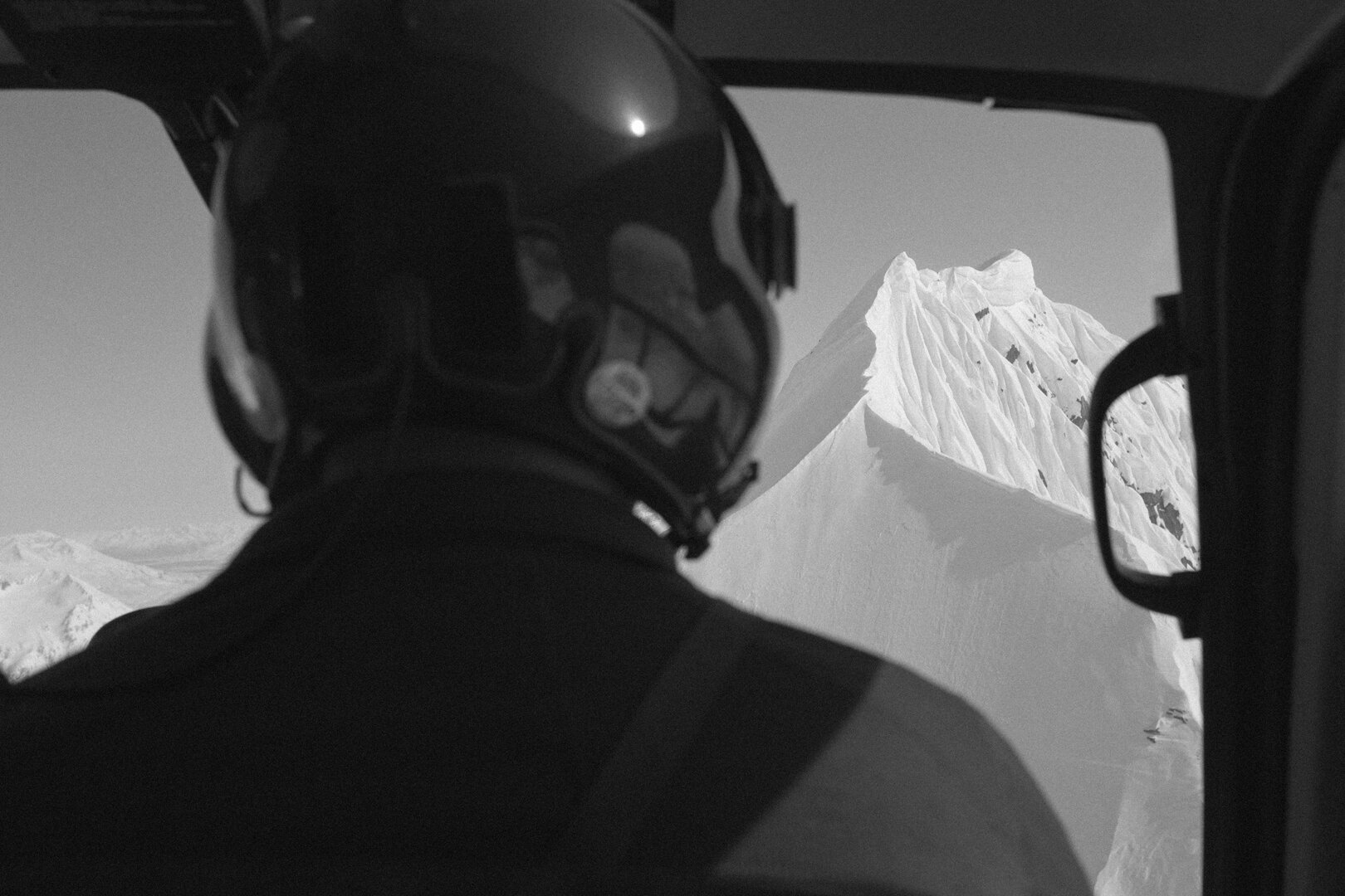 Looking out of the helicopter door across the range on the way to a drop-off